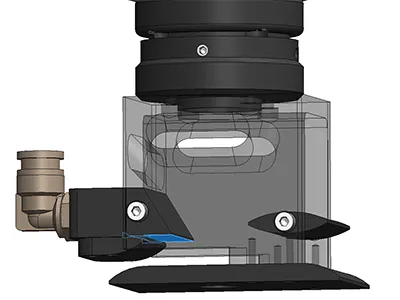 Anti-spatter air curtain for extended lens life
